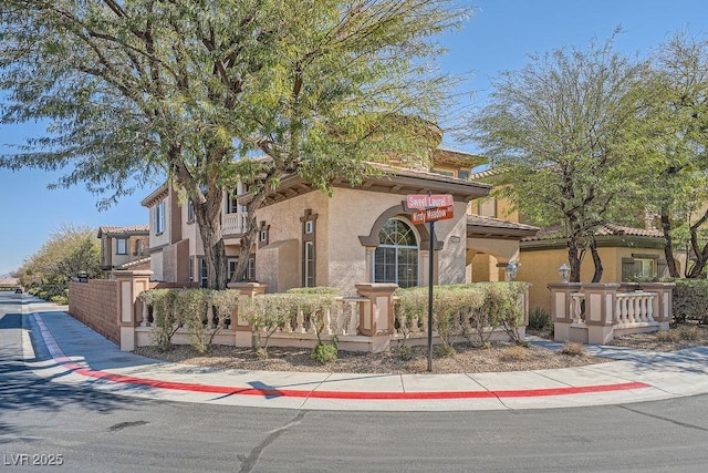 mediterranean / spanish-style house featuring stucco siding