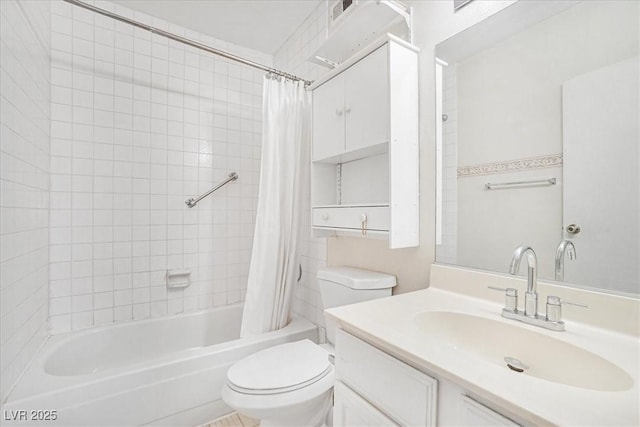 full bathroom with shower / bath combo, vanity, and toilet