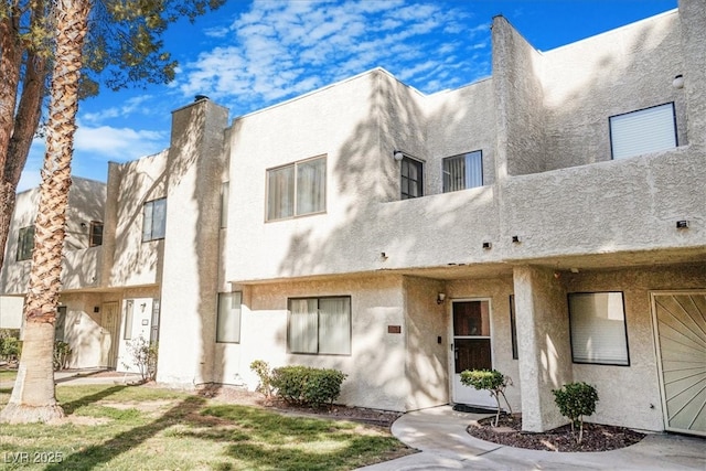 view of front of house featuring stucco siding