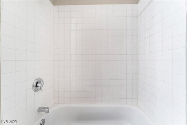 full bath featuring shower / bathtub combination