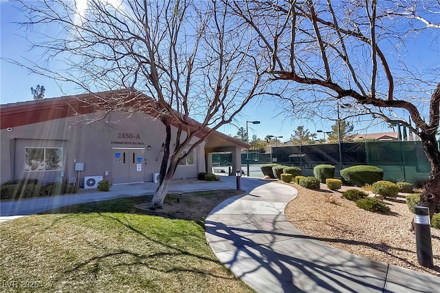 surrounding community featuring fence