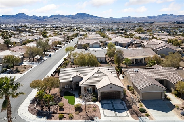 birds eye view of property featuring a residential view and a mountain view