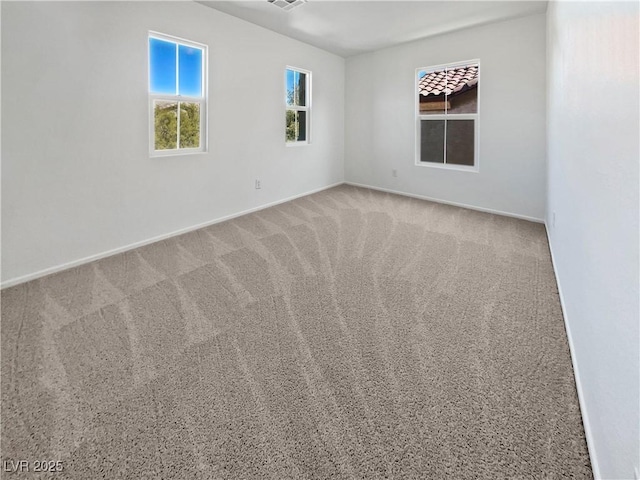 spare room with carpet flooring