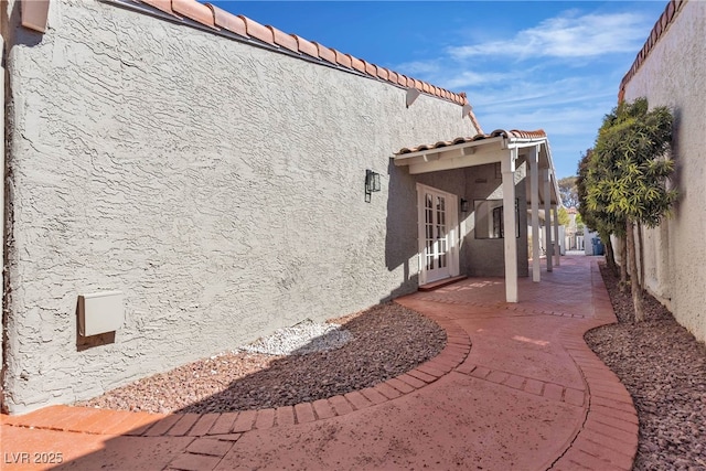 exterior space featuring a patio area and a fenced backyard