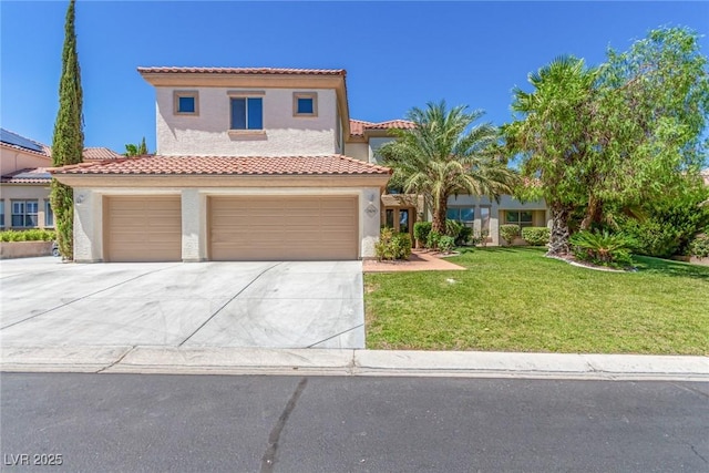 mediterranean / spanish home featuring a garage, driveway, a front yard, and stucco siding