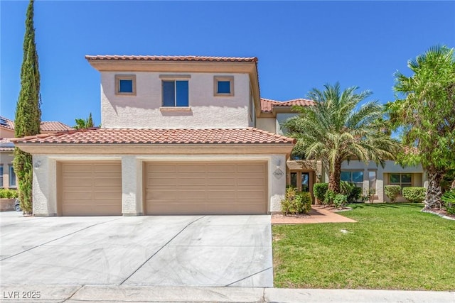 mediterranean / spanish-style house featuring concrete driveway, a front yard, a tile roof, and stucco siding