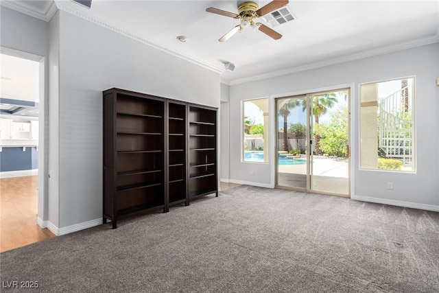 interior space featuring ornamental molding and baseboards