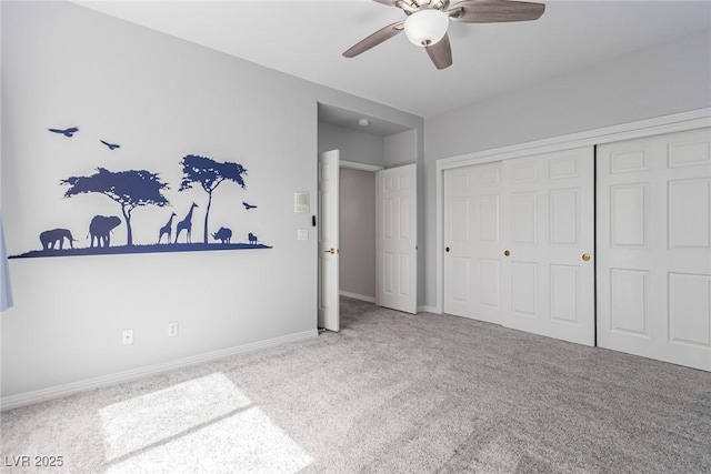 bedroom with ceiling fan, a closet, carpet, and baseboards