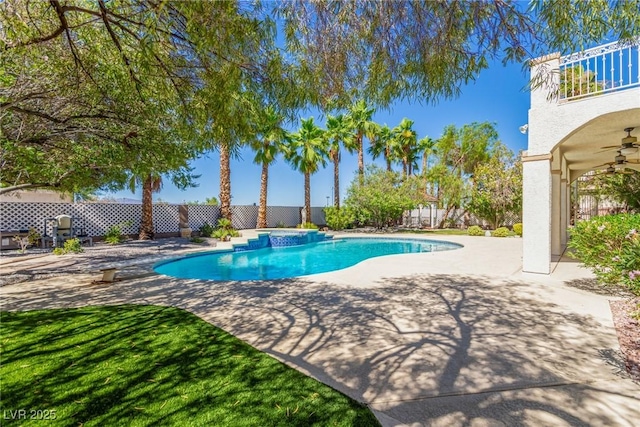 view of pool with a fenced in pool, a fenced backyard, a patio, and a ceiling fan