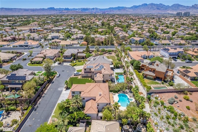 drone / aerial view with a residential view and a mountain view