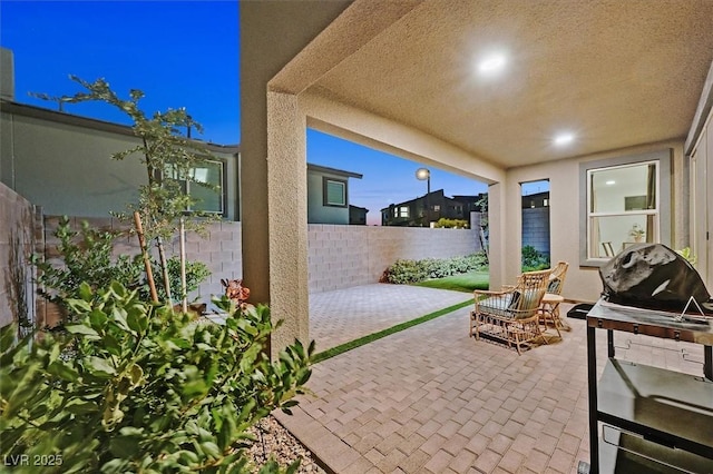 view of patio / terrace with fence