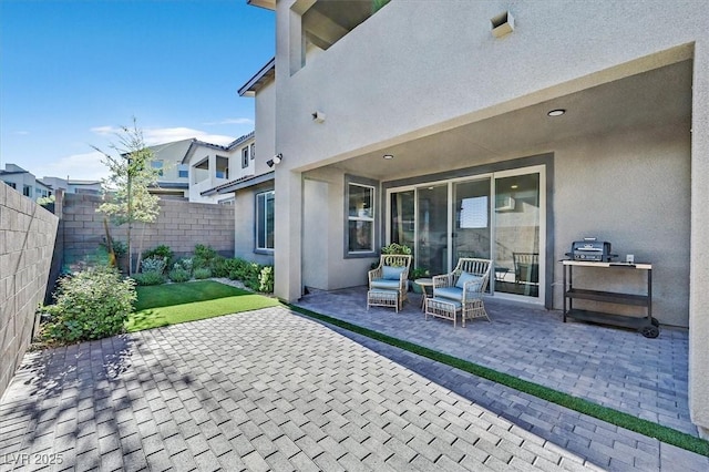 view of patio / terrace with fence