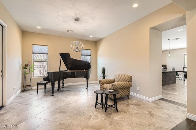 sitting room featuring a chandelier, recessed lighting, visible vents, and baseboards