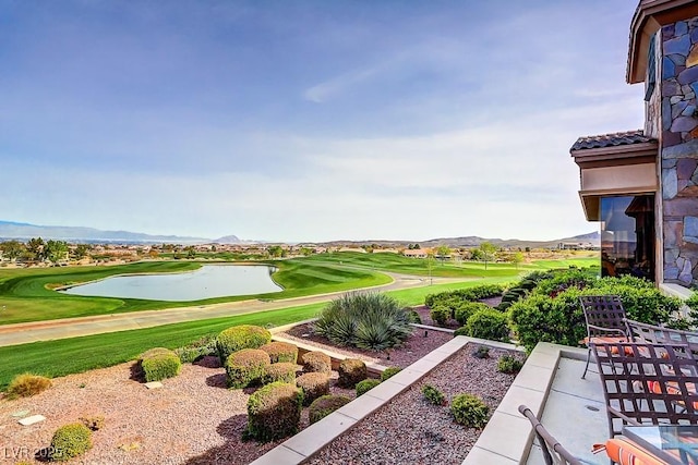 view of community featuring view of golf course