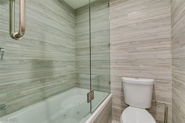 full bath with a combined bath / shower with jetted tub and toilet