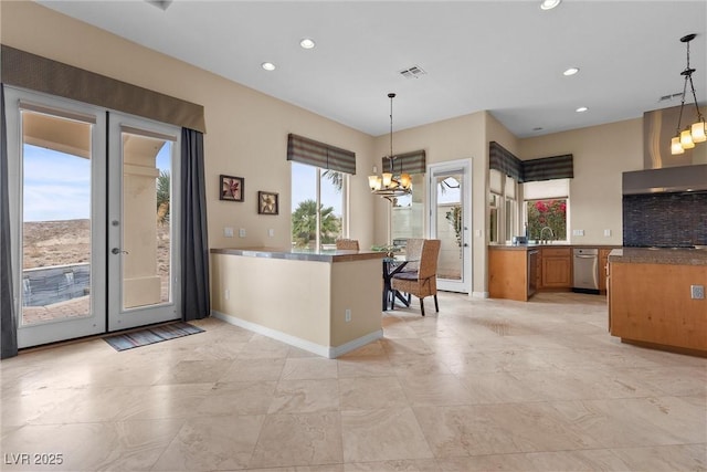 kitchen featuring visible vents, recessed lighting, french doors, an inviting chandelier, and brown cabinetry