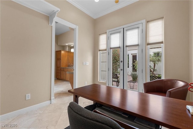 office space featuring crown molding and baseboards