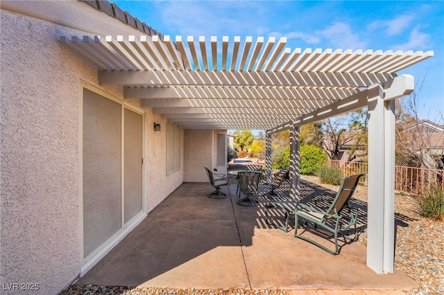 view of patio / terrace featuring fence, outdoor dining area, and a pergola