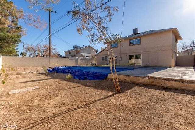 view of pool with a fenced in pool, a fenced backyard, and a patio