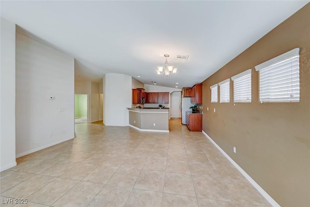 unfurnished living room featuring light tile patterned floors, visible vents, a chandelier, and baseboards