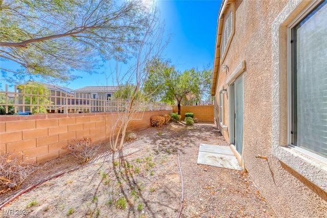 view of yard featuring a fenced backyard