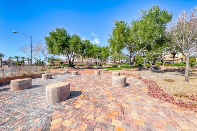 view of patio featuring fence