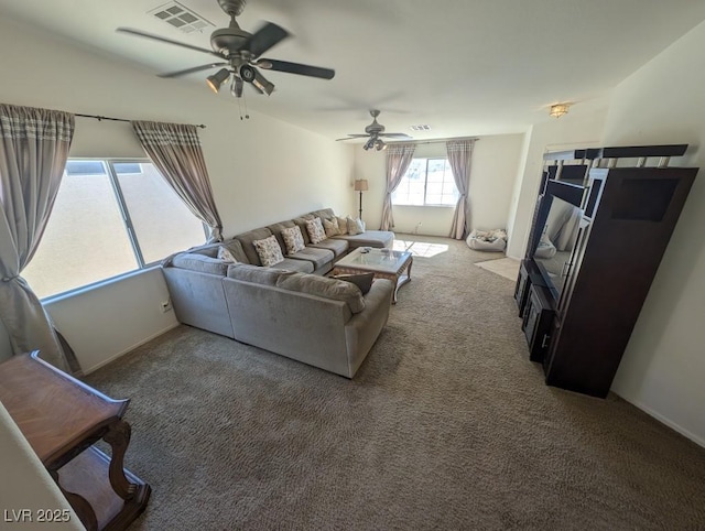 carpeted living area featuring visible vents