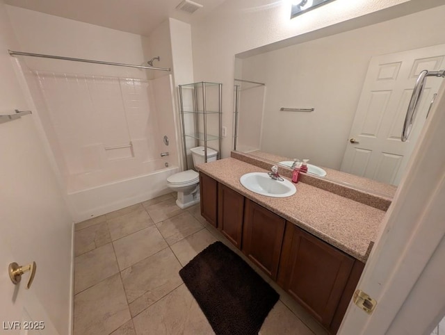 full bath with visible vents, toilet, tile patterned floors, vanity, and washtub / shower combination