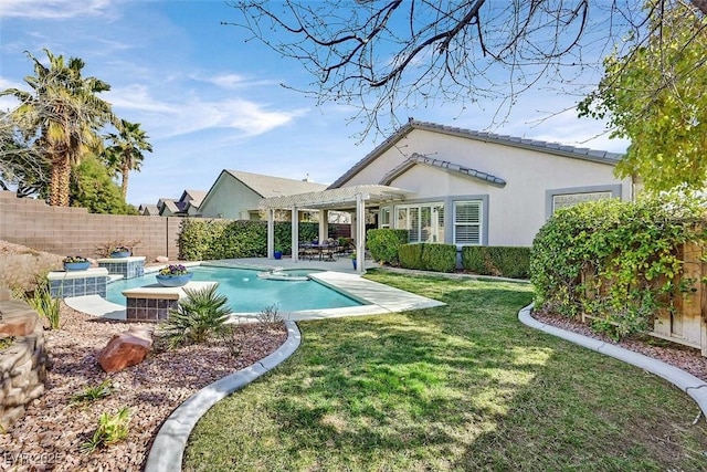 rear view of property featuring a yard, stucco siding, a patio area, a pergola, and a fenced backyard