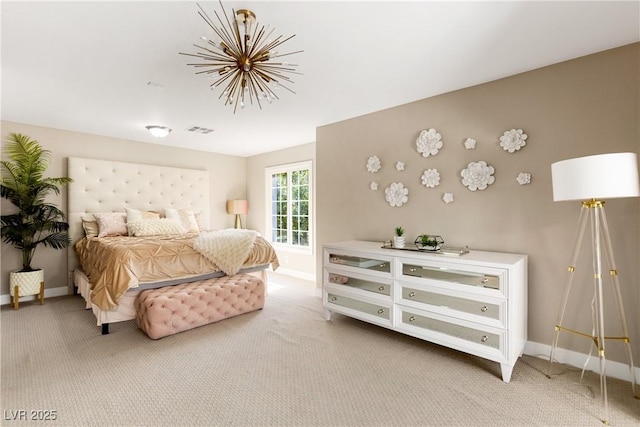 bedroom with baseboards, visible vents, and light colored carpet