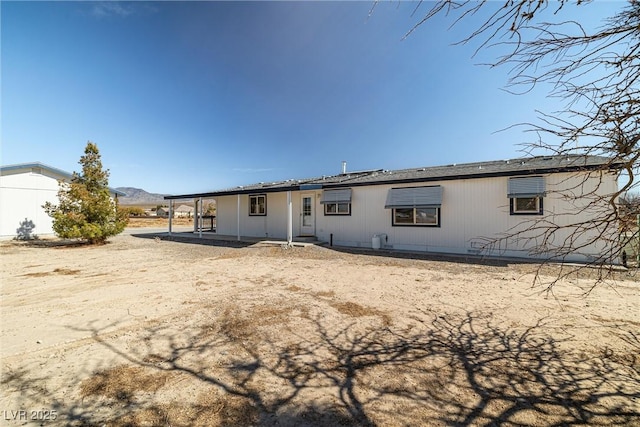 rear view of house with a patio area