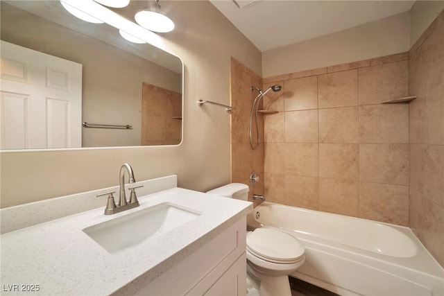 bathroom with toilet, shower / washtub combination, and vanity