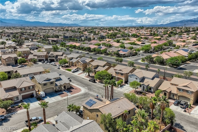 drone / aerial view with a residential view and a mountain view