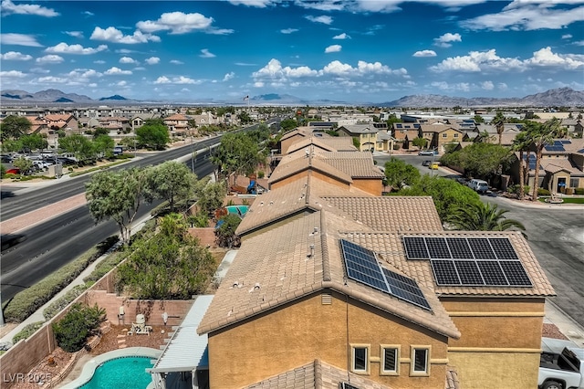 bird's eye view with a residential view and a mountain view