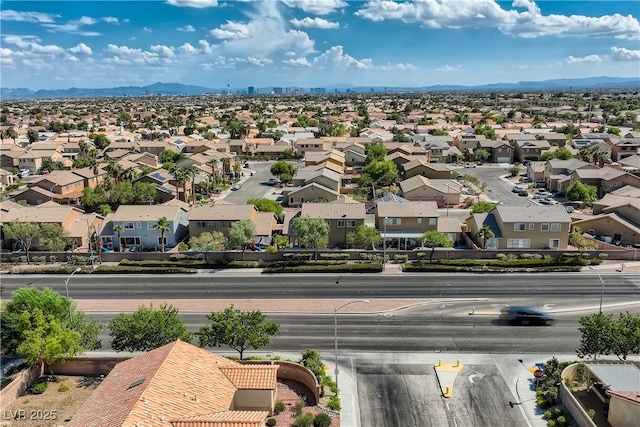 birds eye view of property featuring a residential view and a mountain view