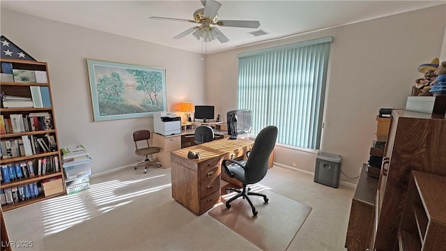 office with carpet, baseboards, and a ceiling fan