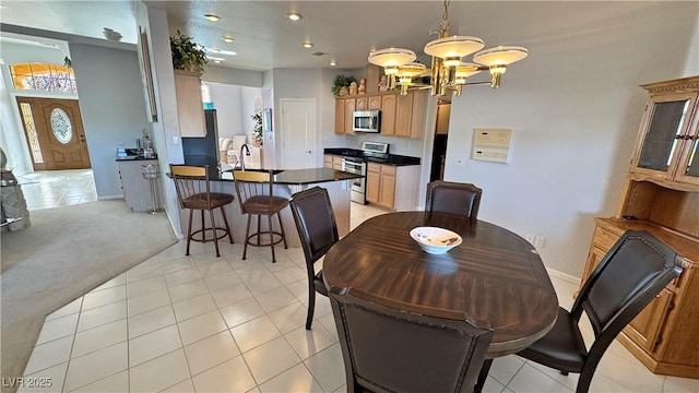 dining space featuring light carpet, baseboards, light tile patterned flooring, a notable chandelier, and recessed lighting