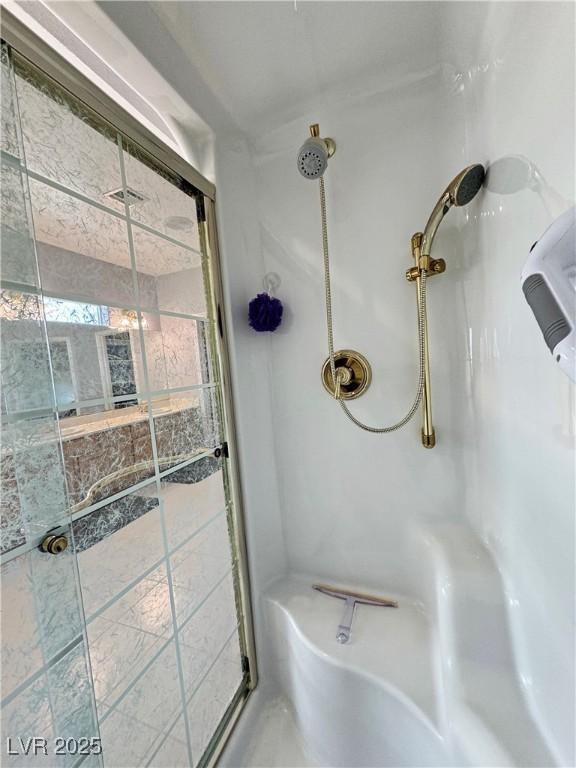 full bathroom with a shower stall