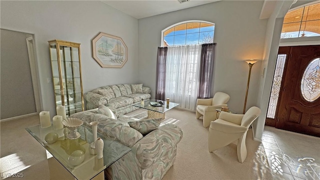 carpeted living room with visible vents