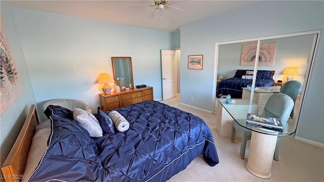 bedroom with carpet floors, baseboards, and a ceiling fan