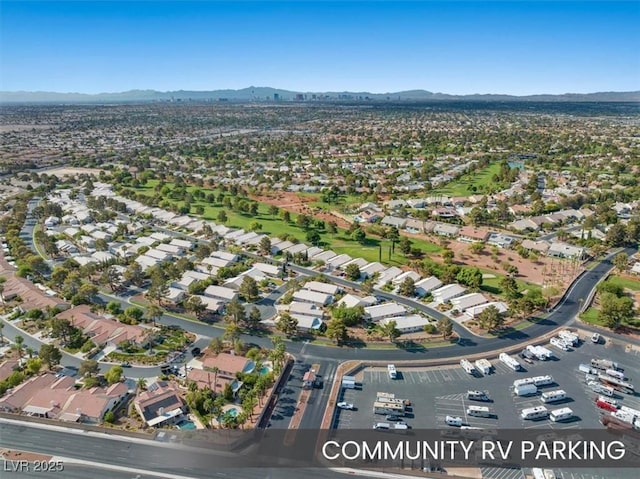 aerial view with a residential view and a mountain view