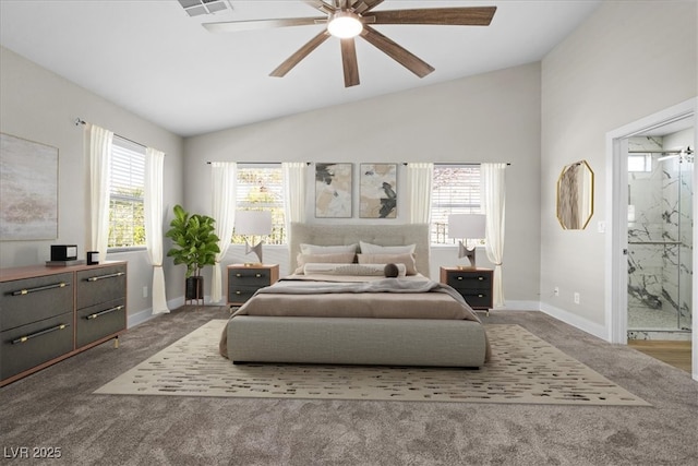 bedroom with carpet floors, lofted ceiling, ceiling fan, connected bathroom, and baseboards