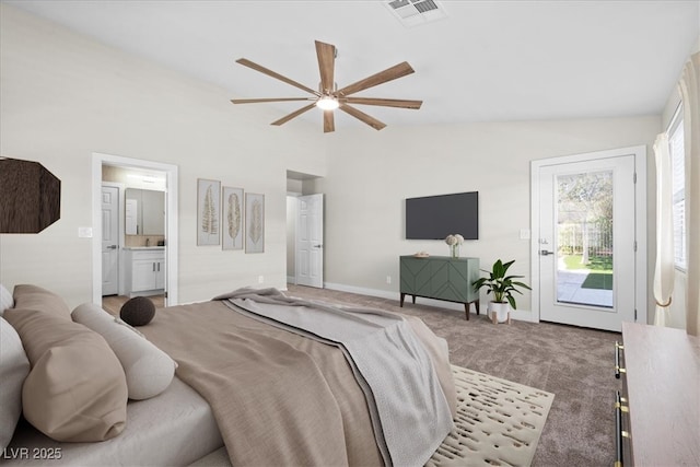 carpeted bedroom featuring baseboards, visible vents, connected bathroom, access to exterior, and vaulted ceiling