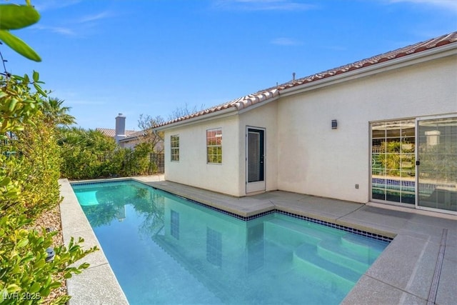 pool with a patio area