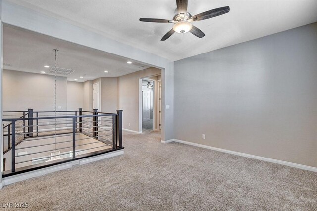 carpeted empty room with recessed lighting, ceiling fan, and baseboards