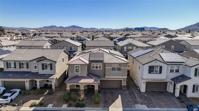 birds eye view of property with a residential view and a mountain view