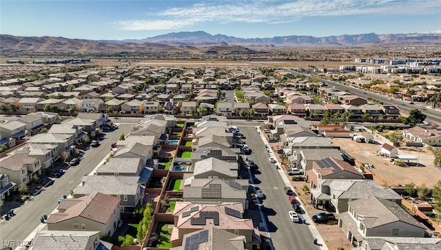 drone / aerial view with a residential view and a mountain view