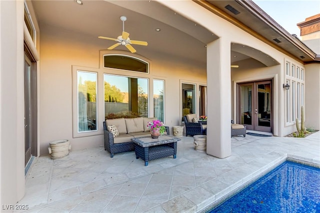 view of patio / terrace featuring an outdoor hangout area and a ceiling fan