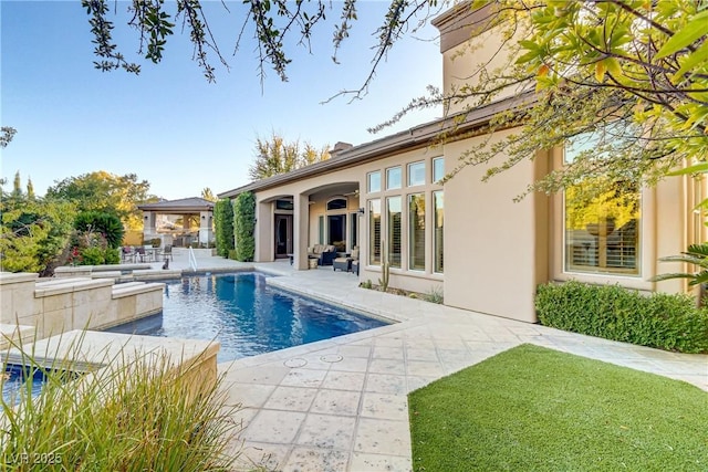 pool with a patio area