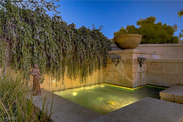 view of yard featuring a patio and fence